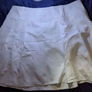 White pleated skirt